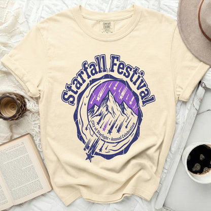 Cream t-shirt with "Starfall Festival City of Starlight Annual Celebration" graphic.