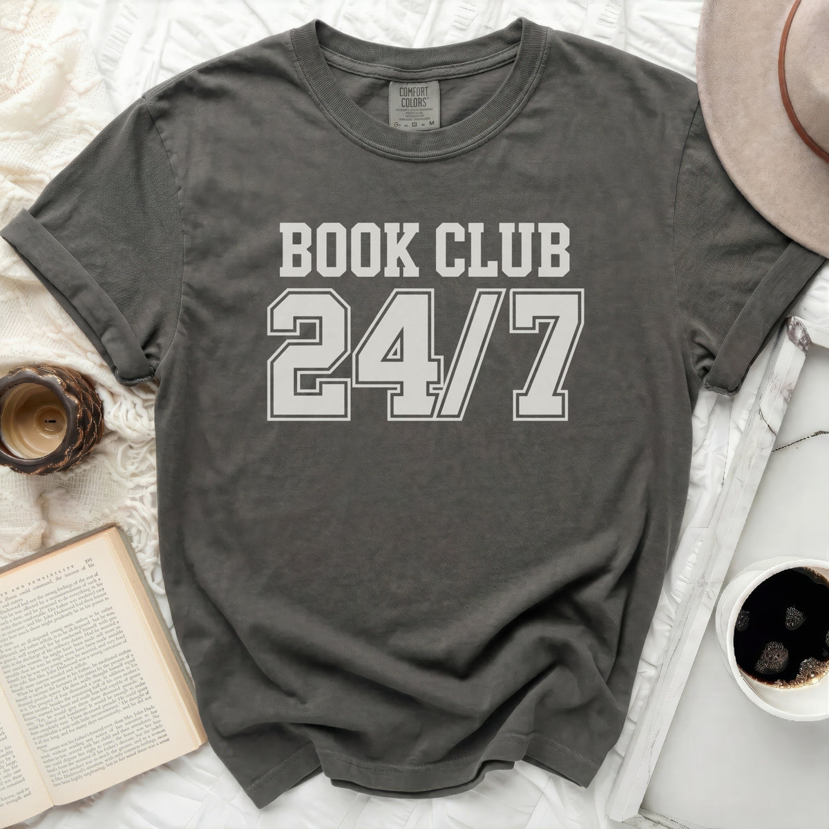 Dark gray Comfort Colors t-shirt with "BOOK CLUB 24/7" printed on it.