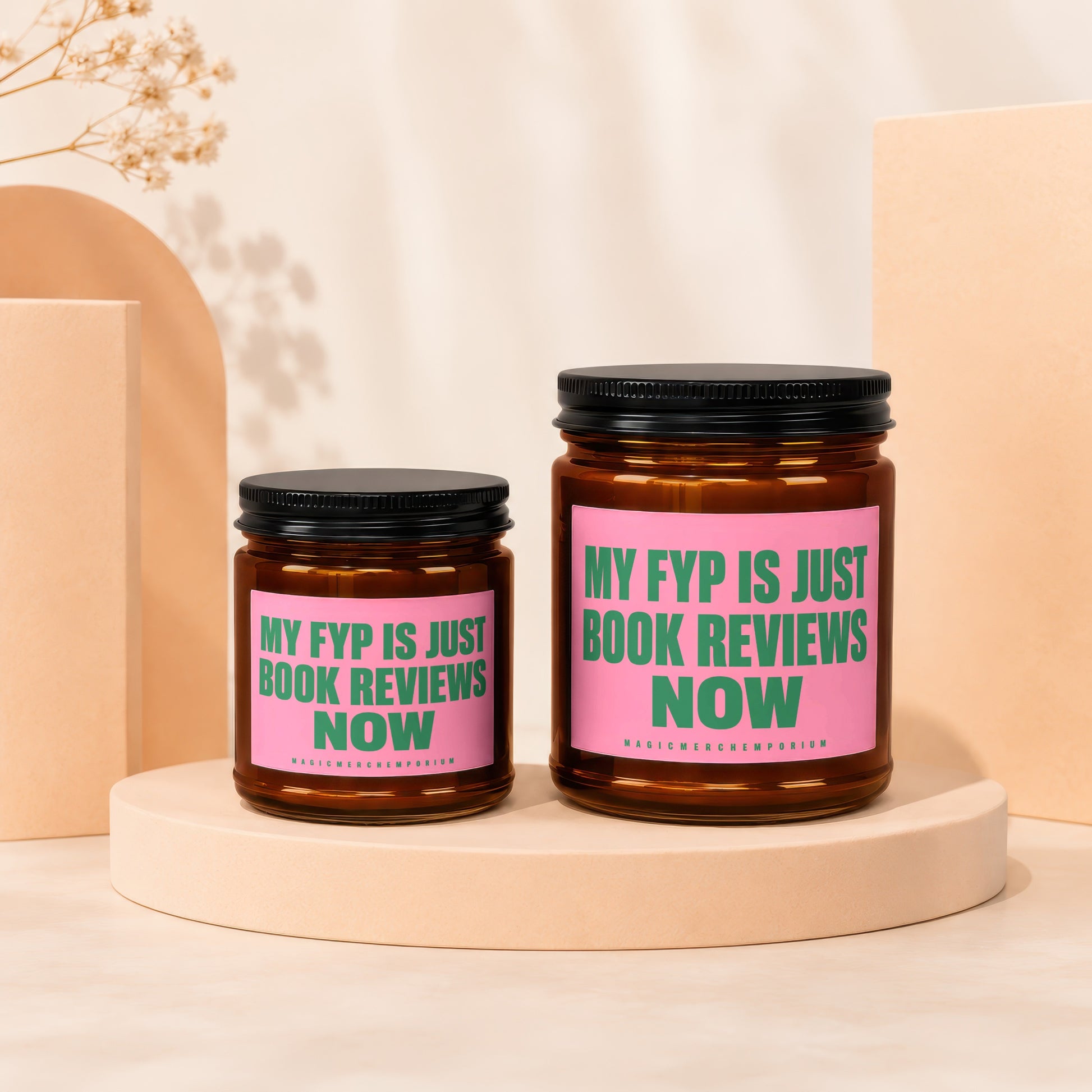 Two amber glass jars with pink labels, reading "My FYP is just book reviews now."