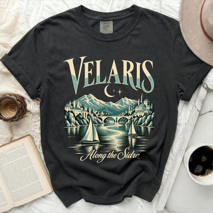 Dark t-shirt with "Velaris Along the Sidro" graphic featuring a cityscape and sailboats.