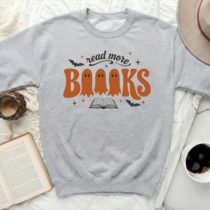 Grey sweatshirt with orange ghost "Books" text and "read more" above.