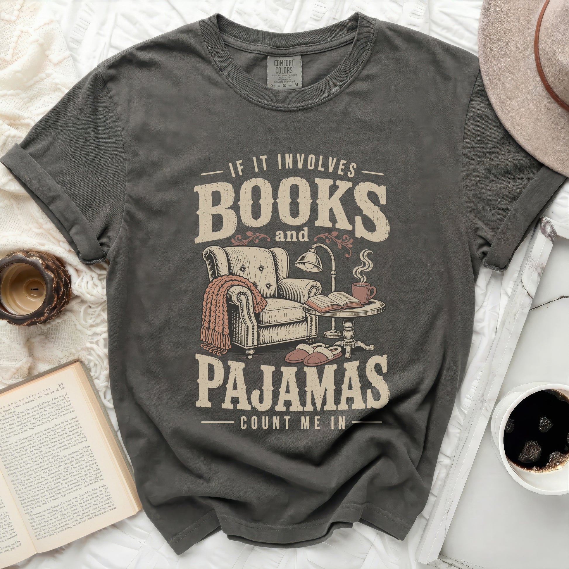 T-shirt with "If it involves Books and Pajamas Count me in" graphic.