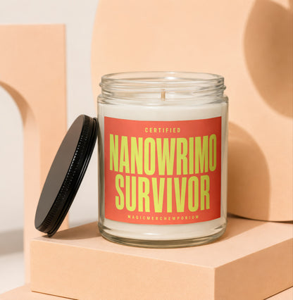 Glass candle with "Certified NaNoWriMo Survivor" on a red label.