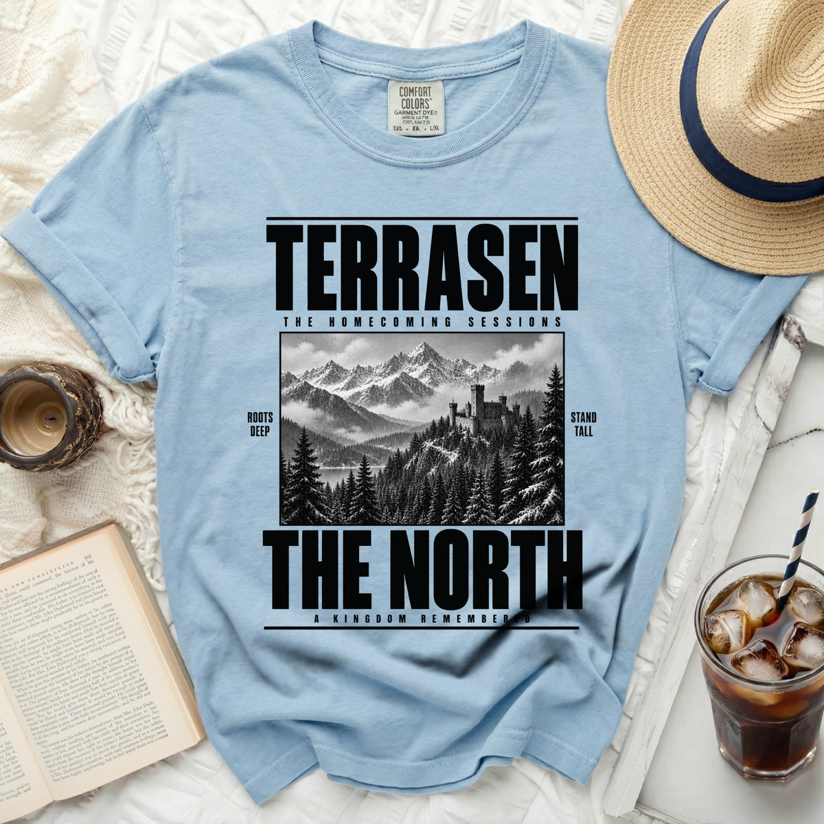 Light blue t-shirt with "TERRASEN THE NORTH" and castle landscape graphic.