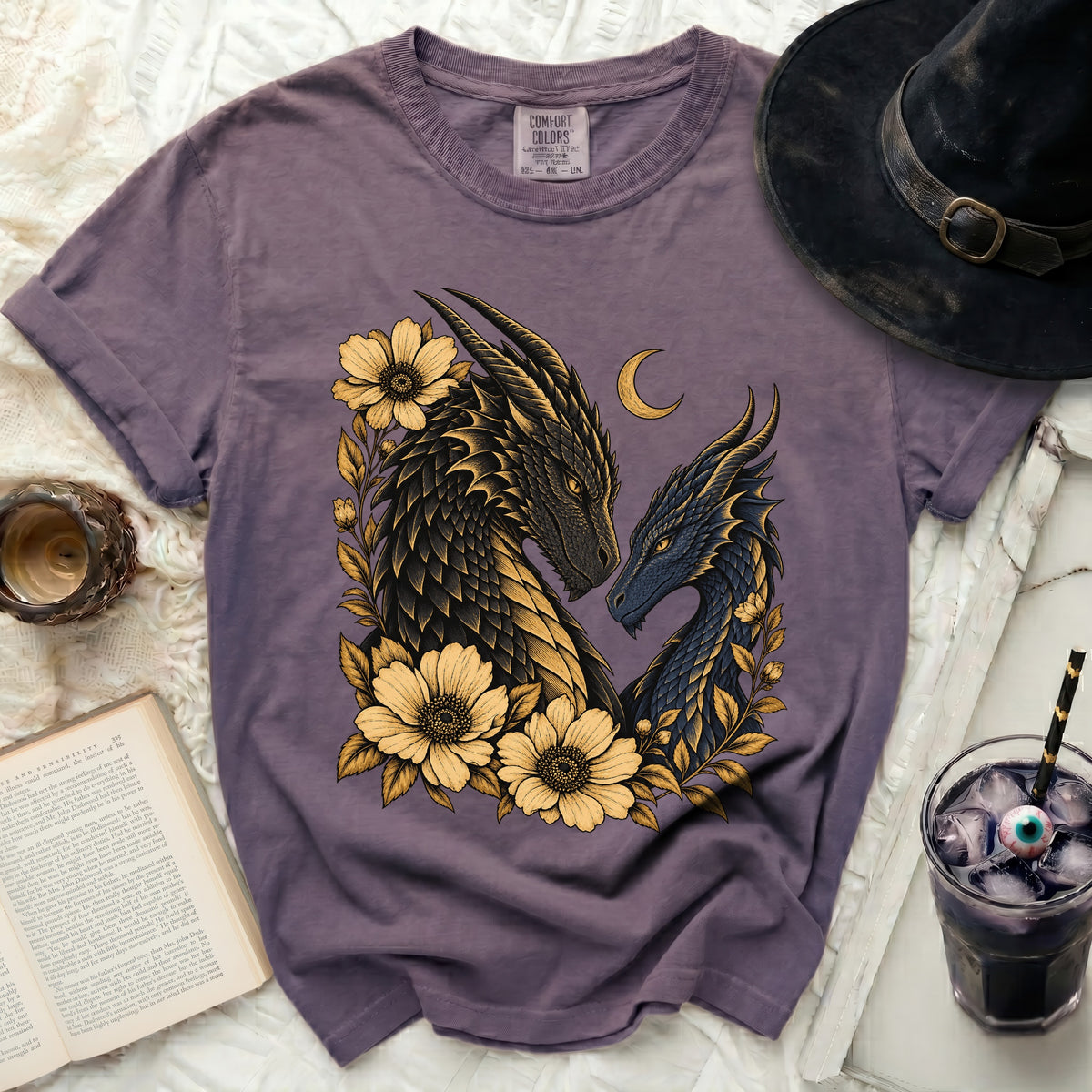 Purple t-shirt with two dragons, flowers, and a crescent moon graphic.