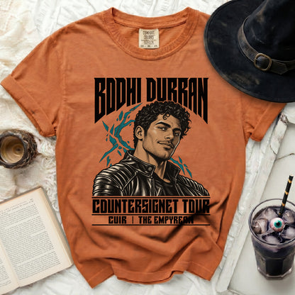 Orange t-shirt with Bodhi Durran and Countersignet Tour graphic.