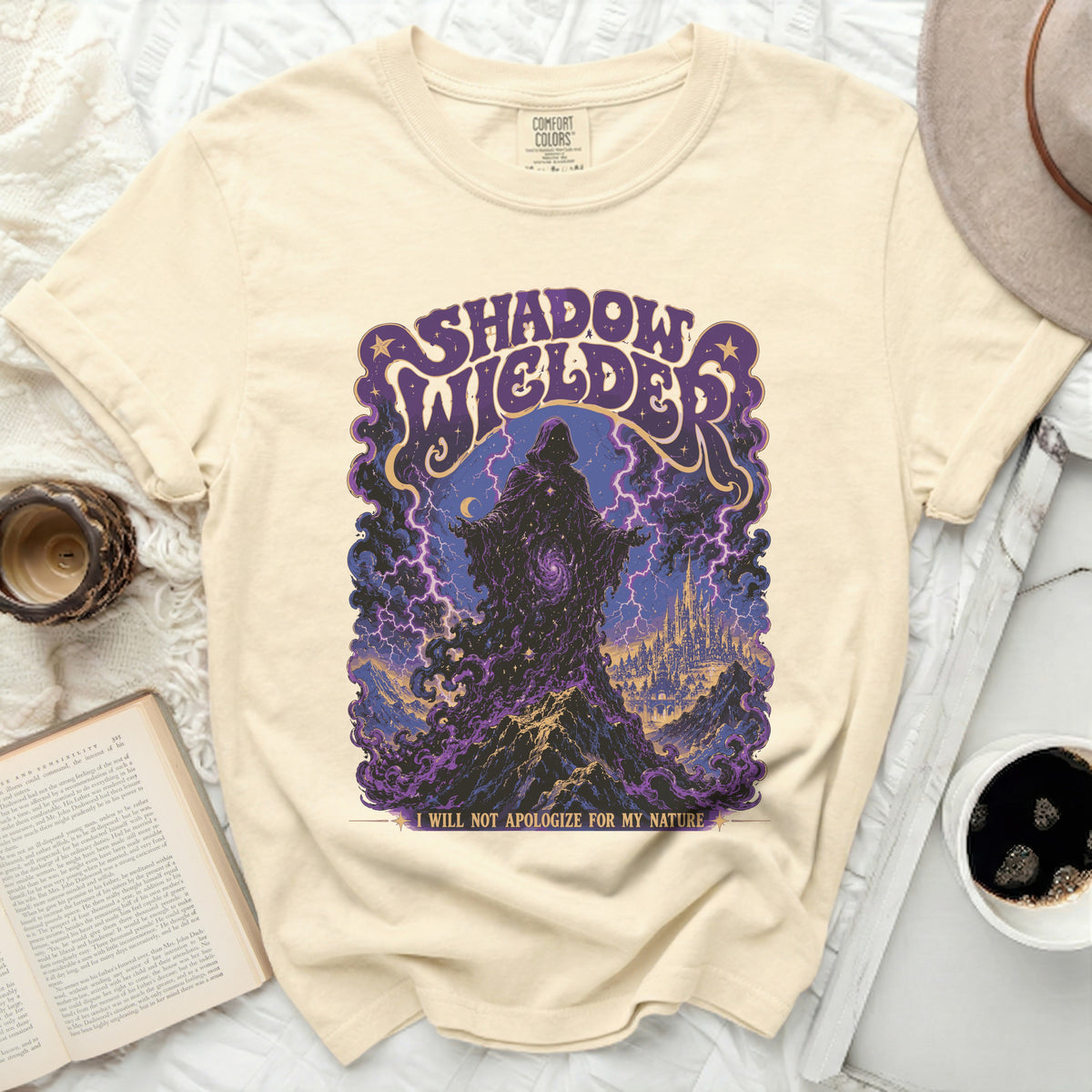 Cream t-shirt with "SHADOW WELDER" and "I WILL NOT APOLOGIZE FOR MY NATURE" text.