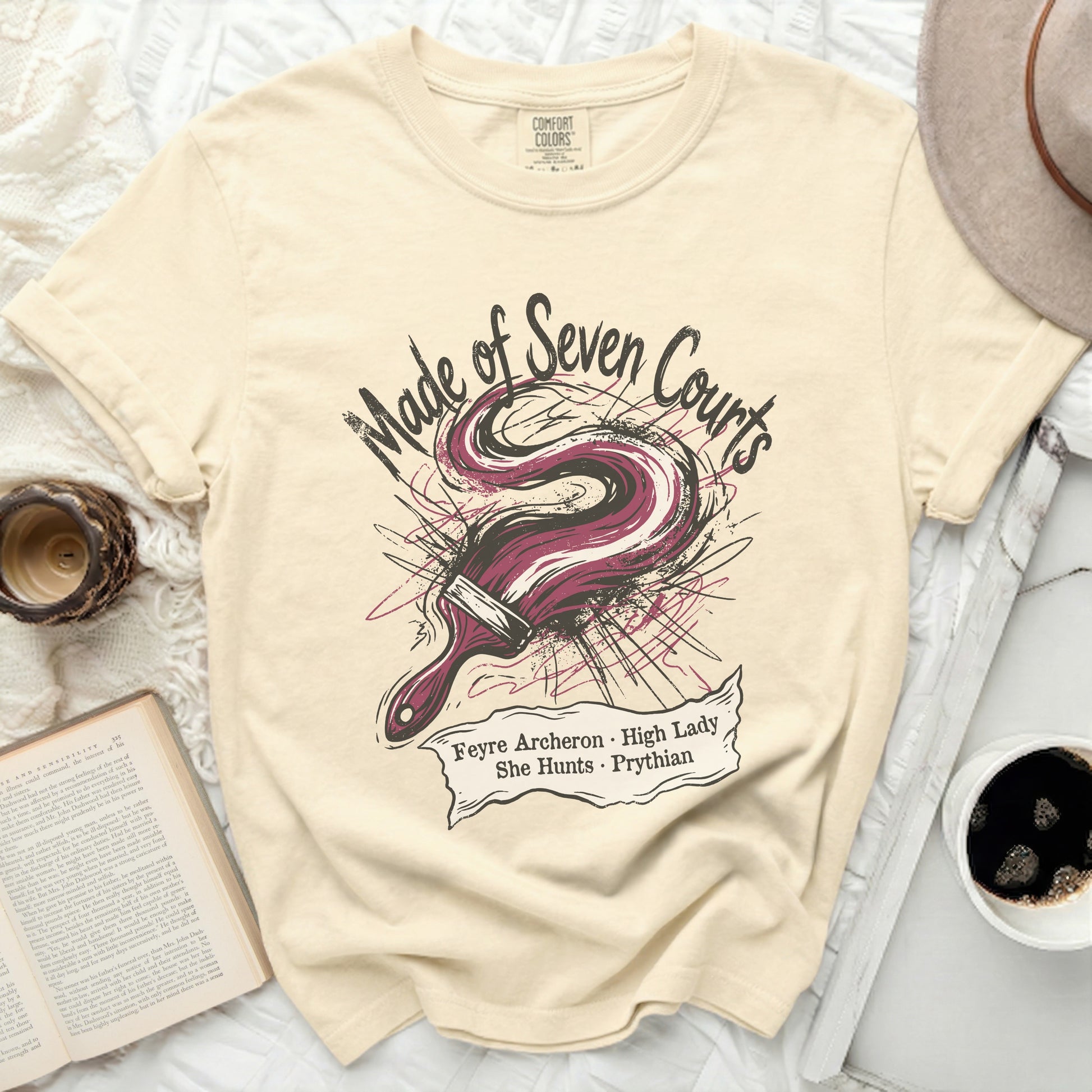 T-shirt with "Made of Seven Courts Feyre Archeron High Lady She Hunts Prythian" design.