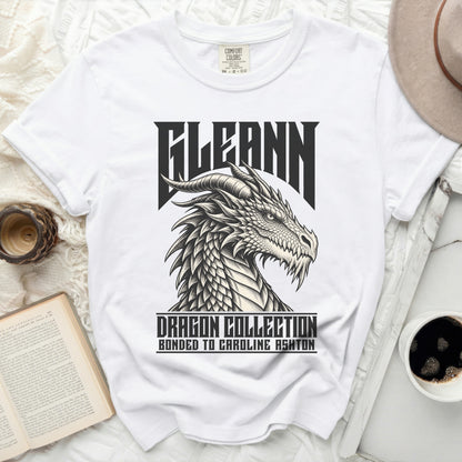 White t-shirt featuring a black and white dragon graphic with text "FLEANN" and "Dragon Collection".