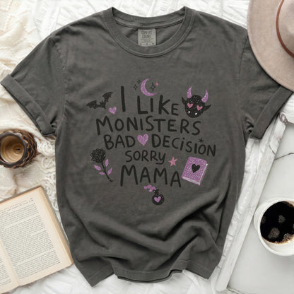 "I Like Monsters Bad Decision Sorry Mama" graphic t-shirt with spooky illustrations.