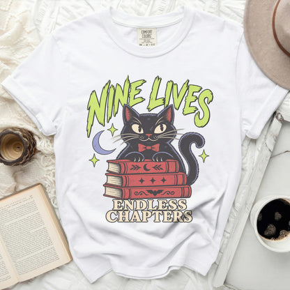 Black cat wearing bowtie on books with text "Nine Lives Endless Chapters".
