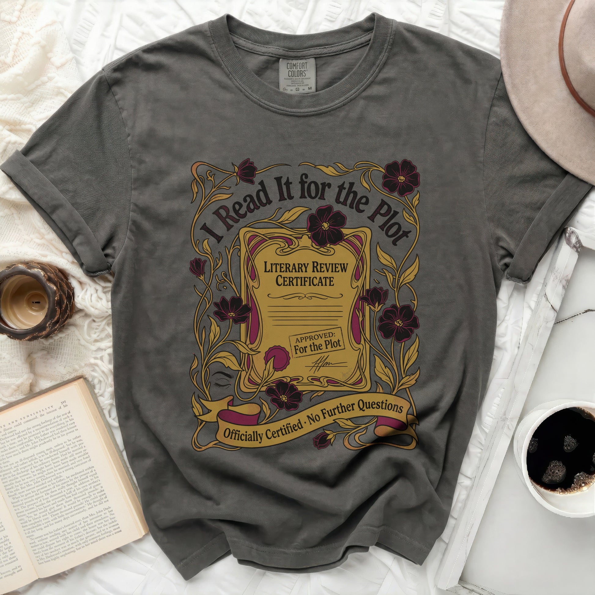 T-shirt with "I Read It for the Plot Literary Review Certificate" graphic.