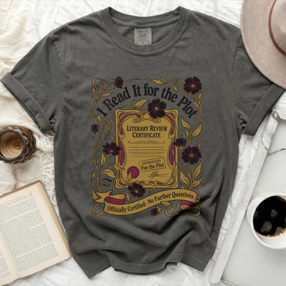 T-shirt with "I Read It for the Plot Literary Review Certificate" graphic.