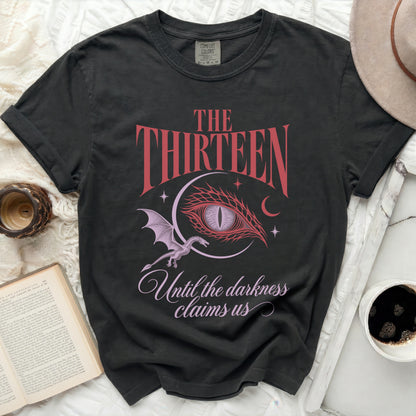 Black t-shirt with "The Thirteen" and dragon eye design and text "Until the darkness claims us".