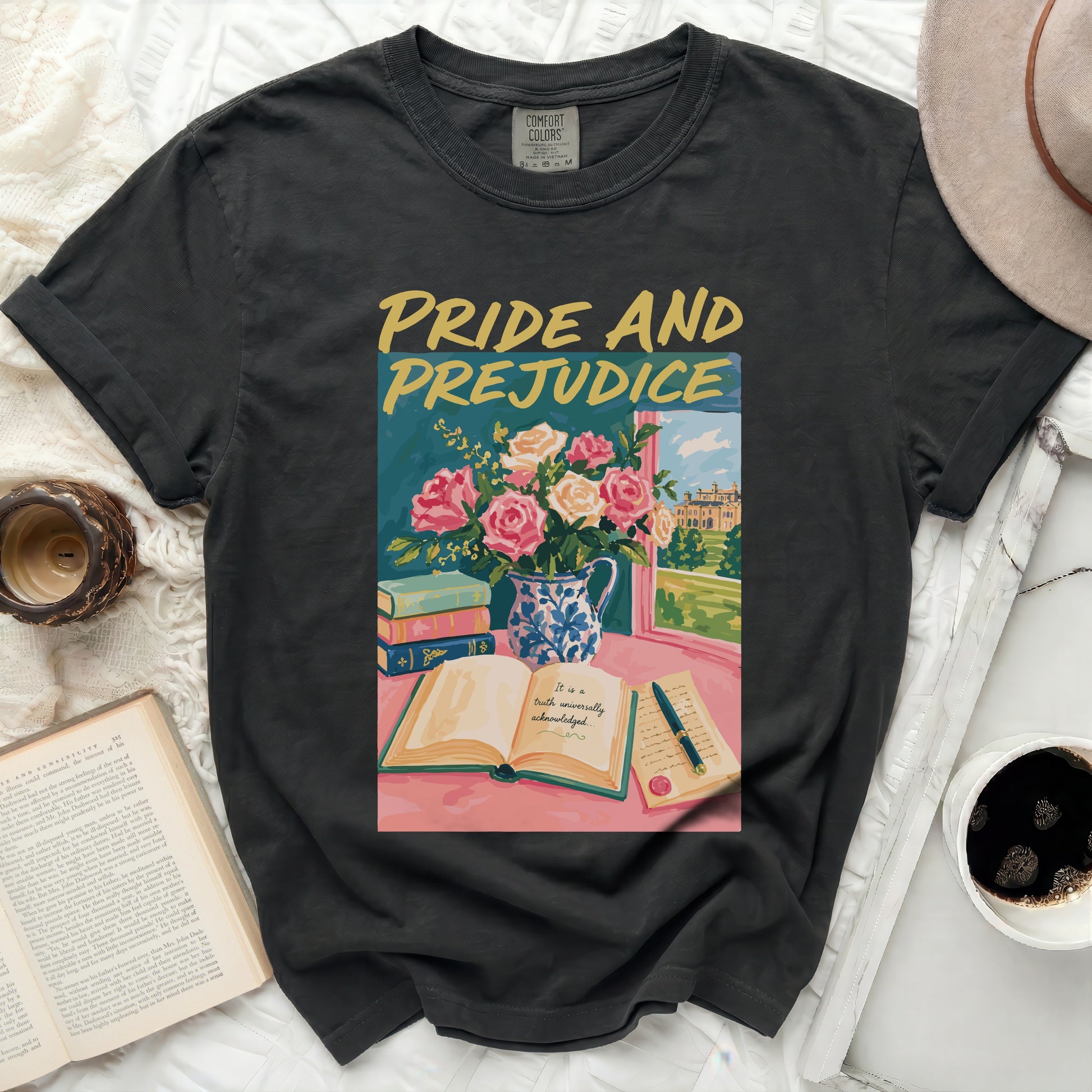 T-shirt with "Pride and Prejudice" floral book graphic.