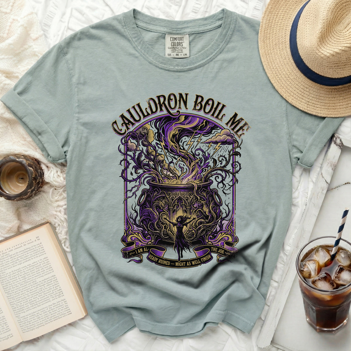 Light green t-shirt with "Cauldron Boil Me" and witch graphic.