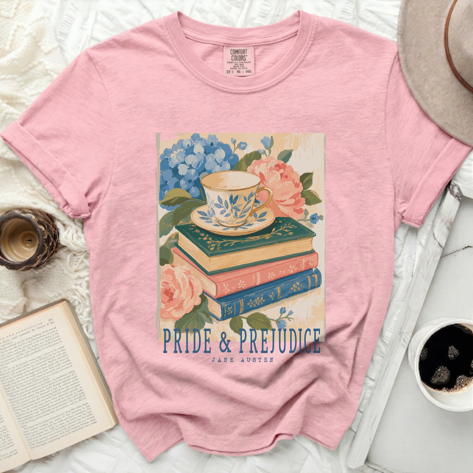 Pink t-shirt with "Pride & Prejudice" Jane Austen graphic.