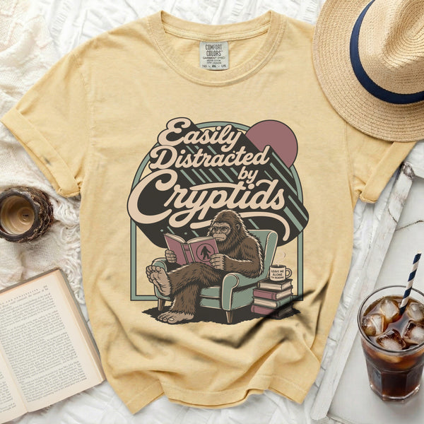 Easily Distracted Cryptid Reader Tee in Butter