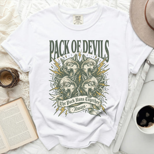 White t-shirt with "Pack of Devils" and lightning graphic.