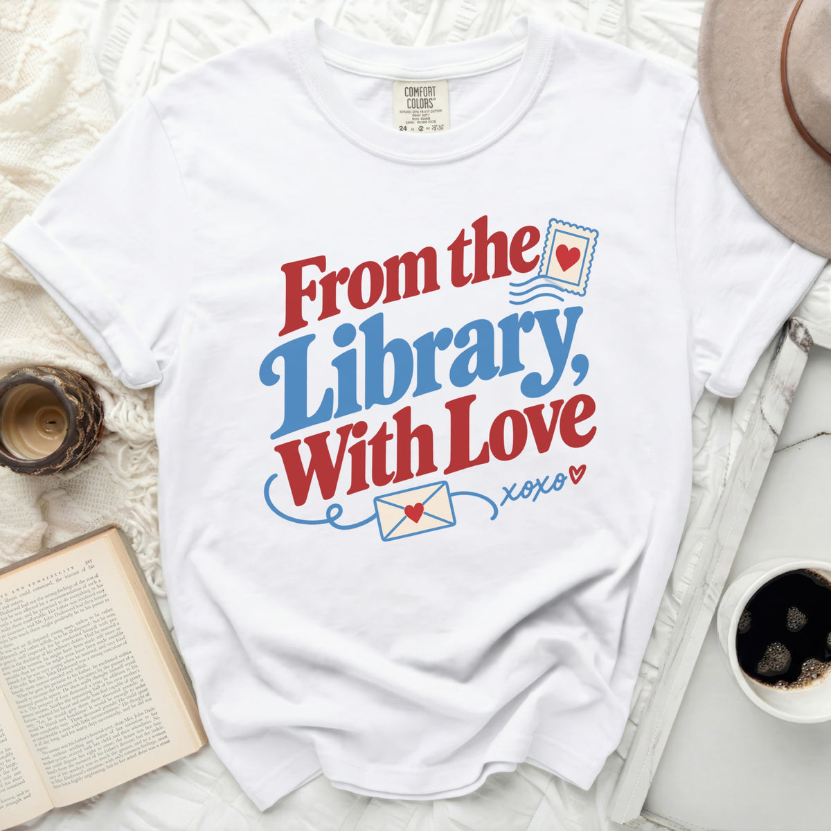 White t-shirt with "From the Library, With Love xoxo" graphic.