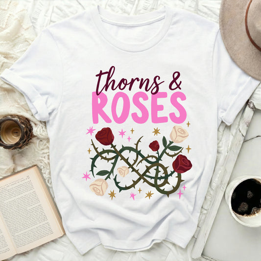 thorns & ROSES Graphic Design T-shirt product type
thorns roses
graphic tee
floral design
rose shirt
romantic tee
nature inspired
botanical print
aesthetic shirt
trendy tee
casual wear
streetwear style
summer fashion
spring fashion
unique print
gift idea
plant illustration
vine design
white t-shirt
star accents
pink lettering