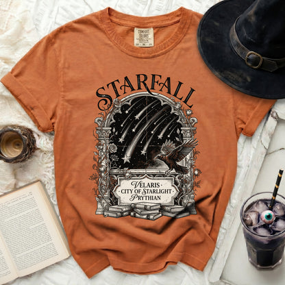 Orange t-shirt with "Starfall Velaris City of Starlight Prythian" graphic and raven.