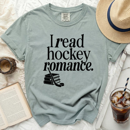 T-shirt with "I read hockey romance" and hockey stick graphic.