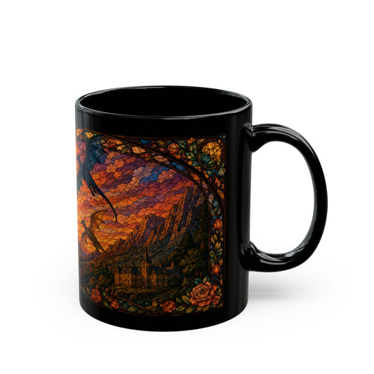 Black mug with a stained-glass design of dragons flying over a castle at sunset.
