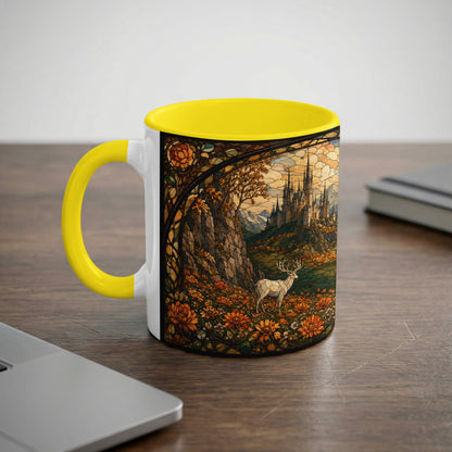 White mug with yellow handle featuring stained glass art of a castle and deer.