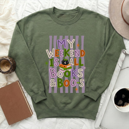 Green sweatshirt with text "MY WEEKEND IS ALL BOOKS & BOO-S" and Halloween graphics.