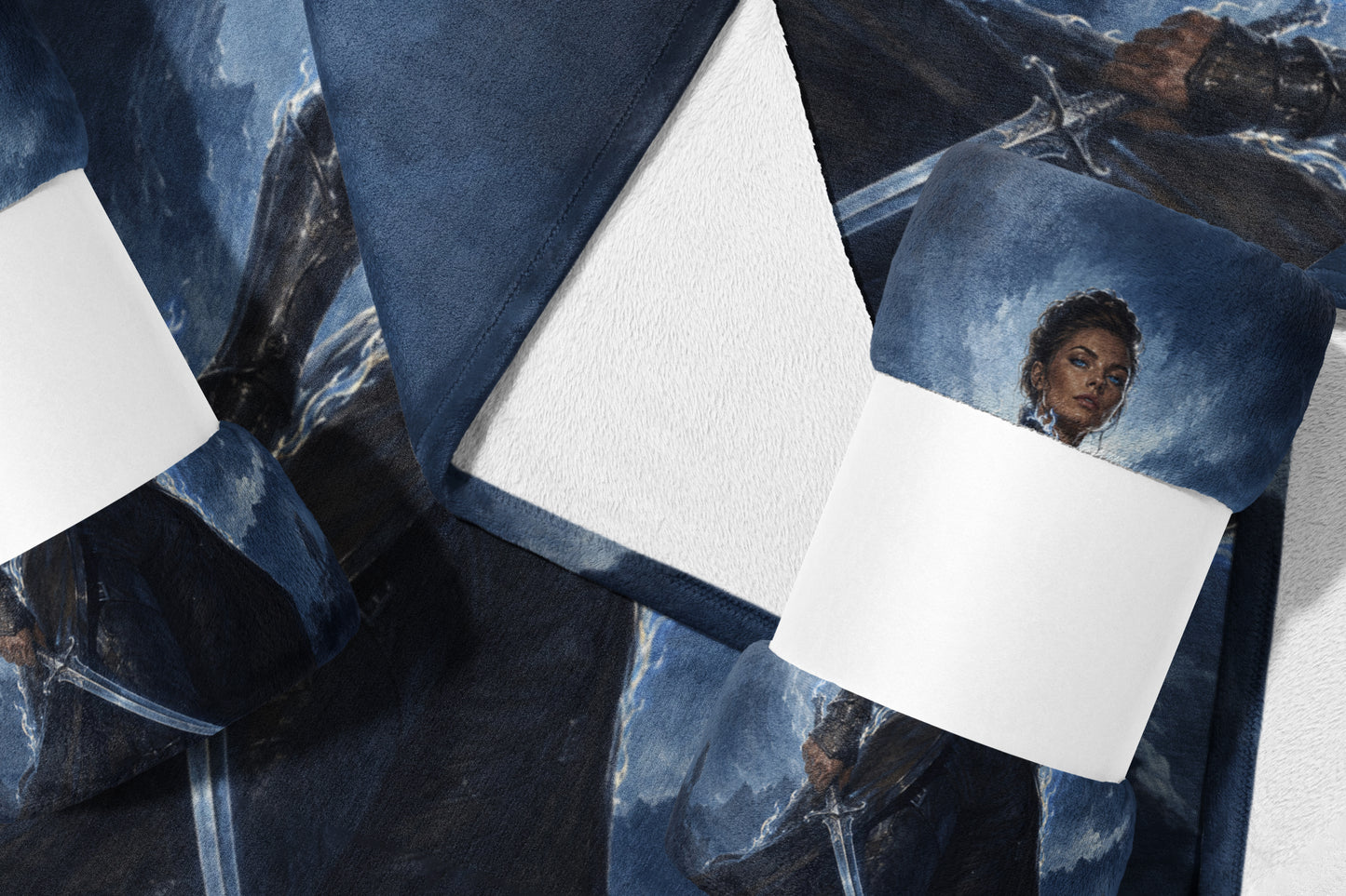 Rolled blue blanket with a fantasy art print of a woman with blue eyes.