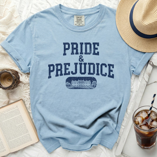 Light blue t-shirt with "Pride & Prejudice" text and stately home graphic.