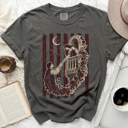 T-shirt with Romeo and Juliet balcony scene illustration and text.