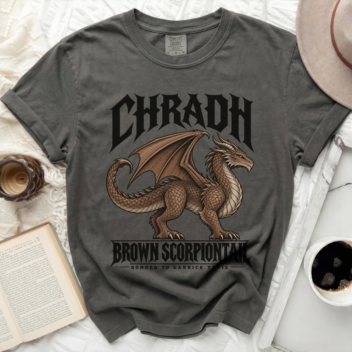 Gray t-shirt with "CHRADH BROWN SCORPIONTAL BONDED TO GARRICK TAVIS" and dragon graphic.