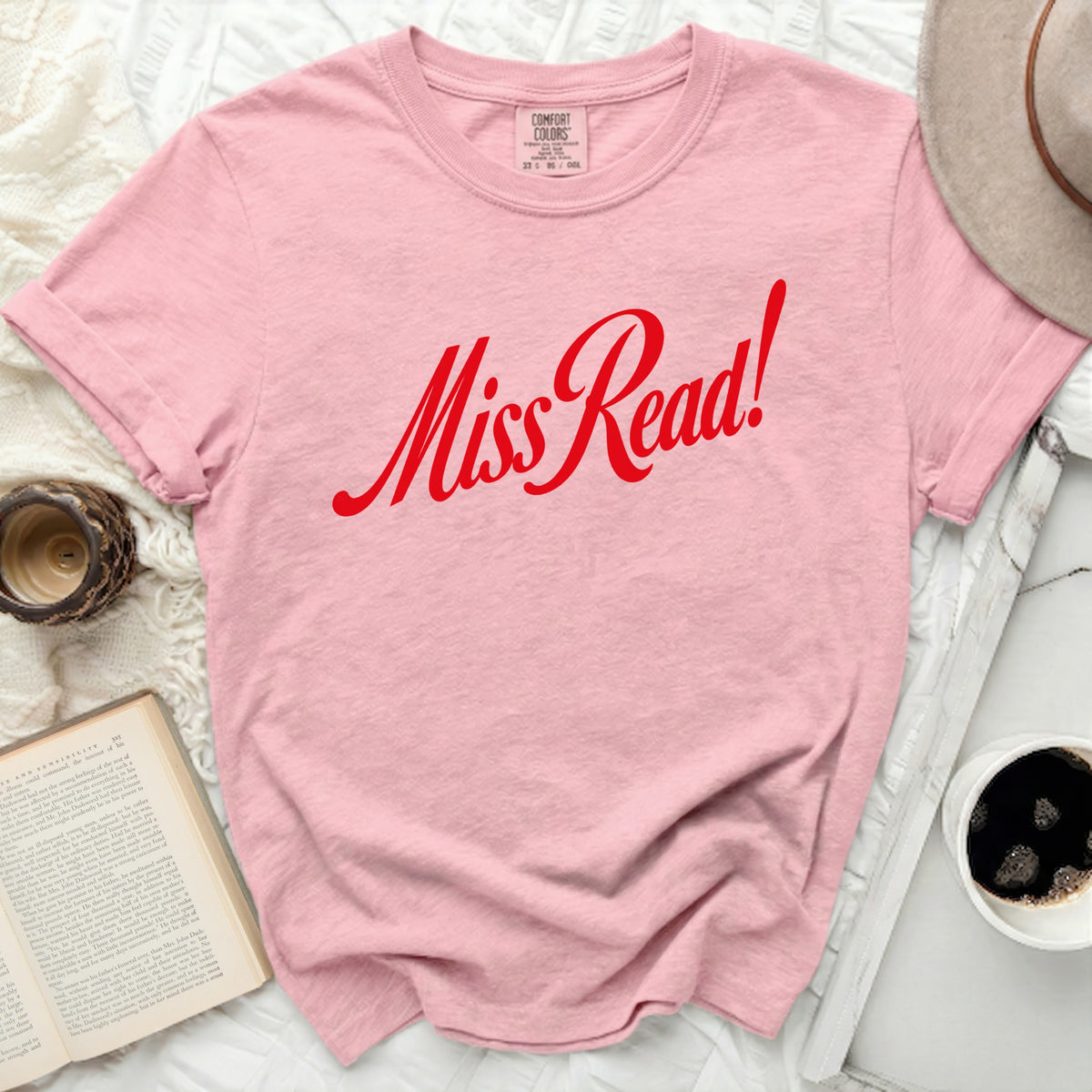 Pink t-shirt with red "Miss Read!" text and Comfort Colors tag.