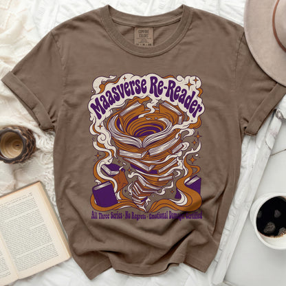 Brown t-shirt with "Maasverse Re-Reader" text and swirling book design.