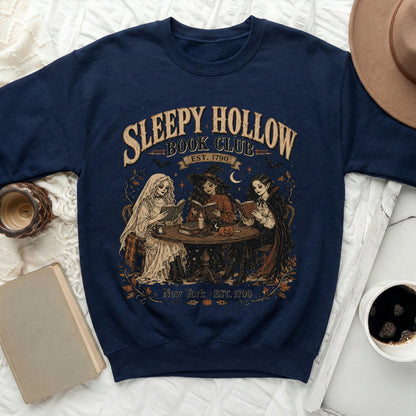 Navy sweatshirt with "Sleepy Hollow Book Club" graphic and three women reading.
