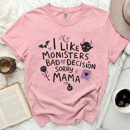 Pink t-shirt with "I like monsters, bad decision, sorry mama" text and gothic motifs.