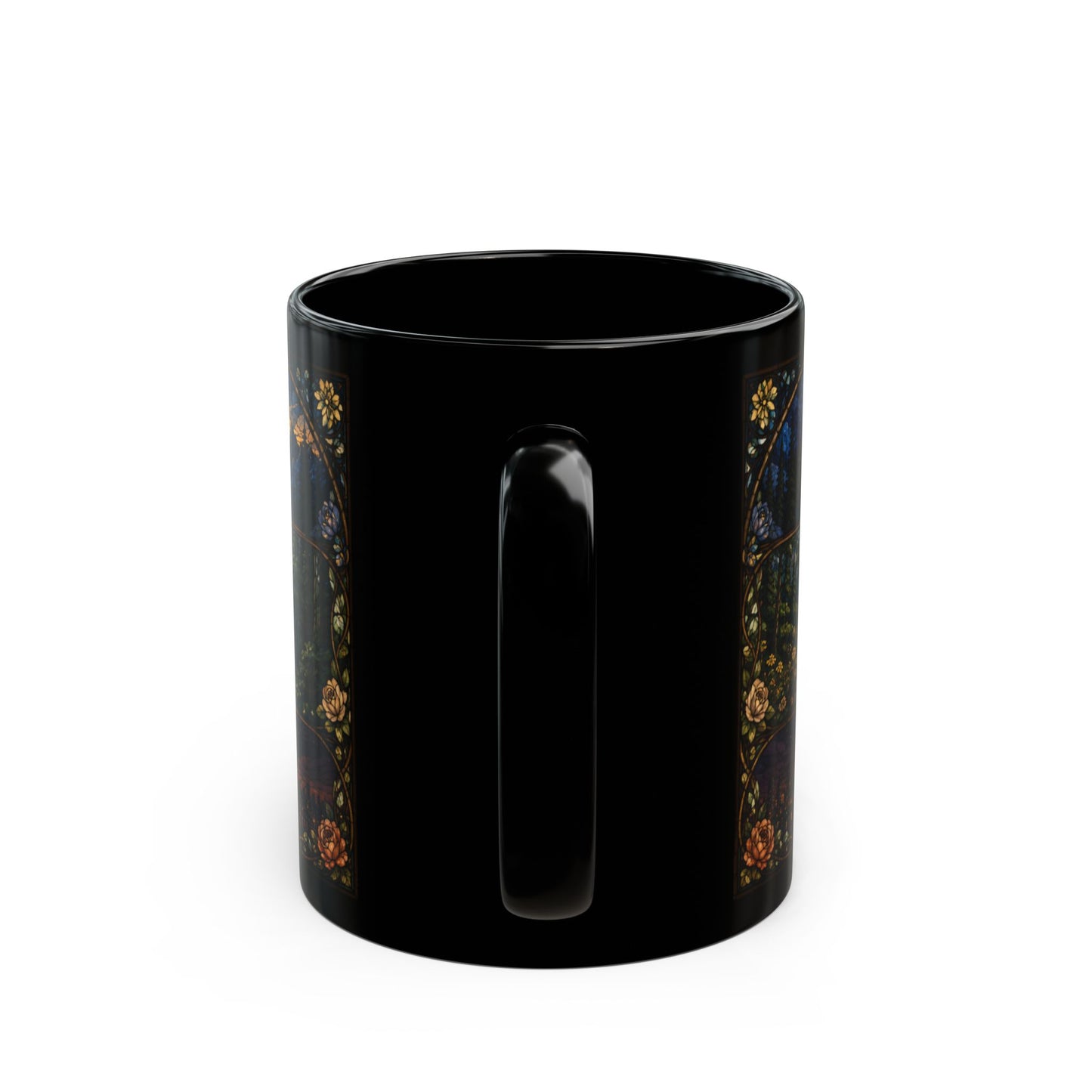 Black mug with a dark floral and vine design on the side.