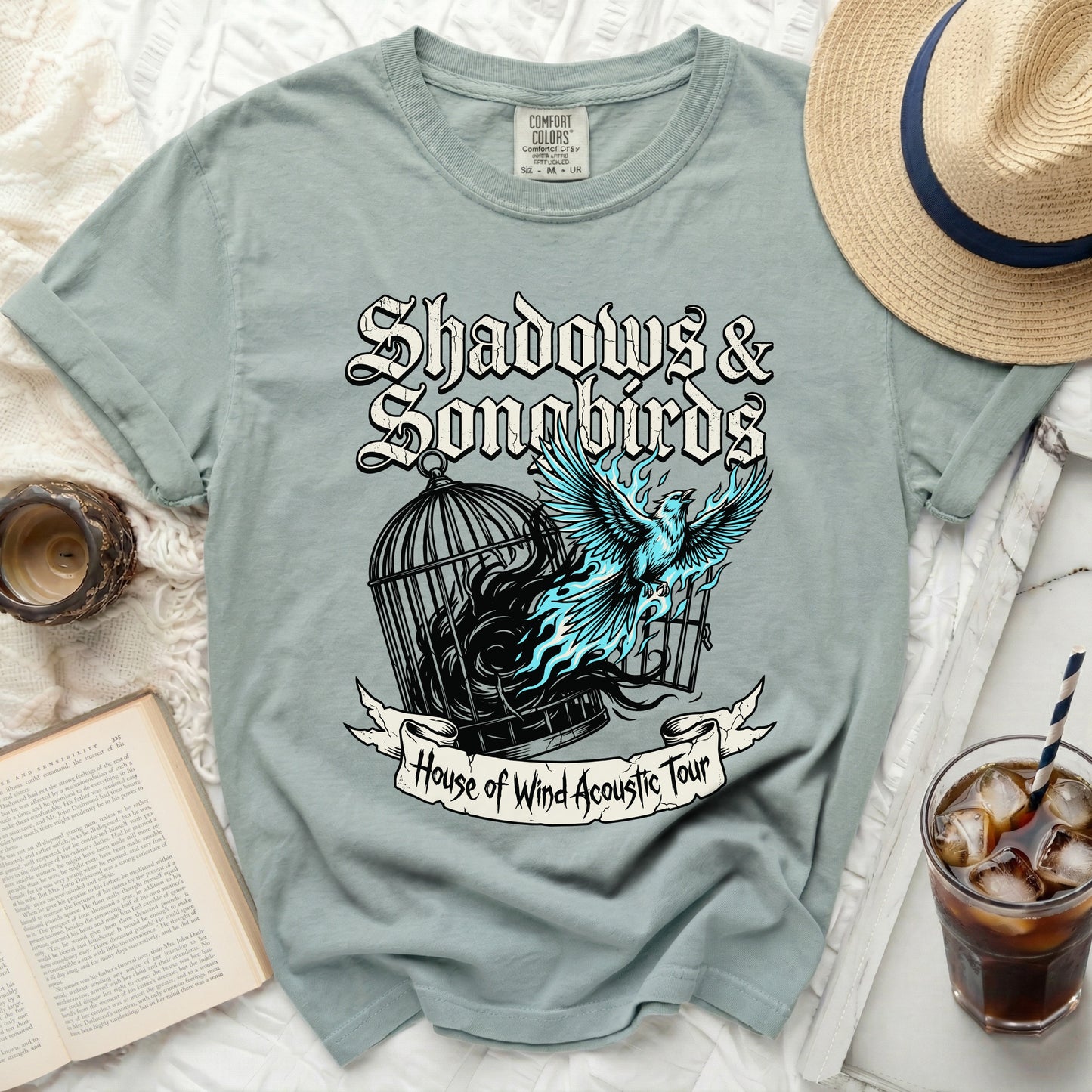 T-shirt with "Shadows & Songbirds" and "House of Wind Acoustic Tour" text.