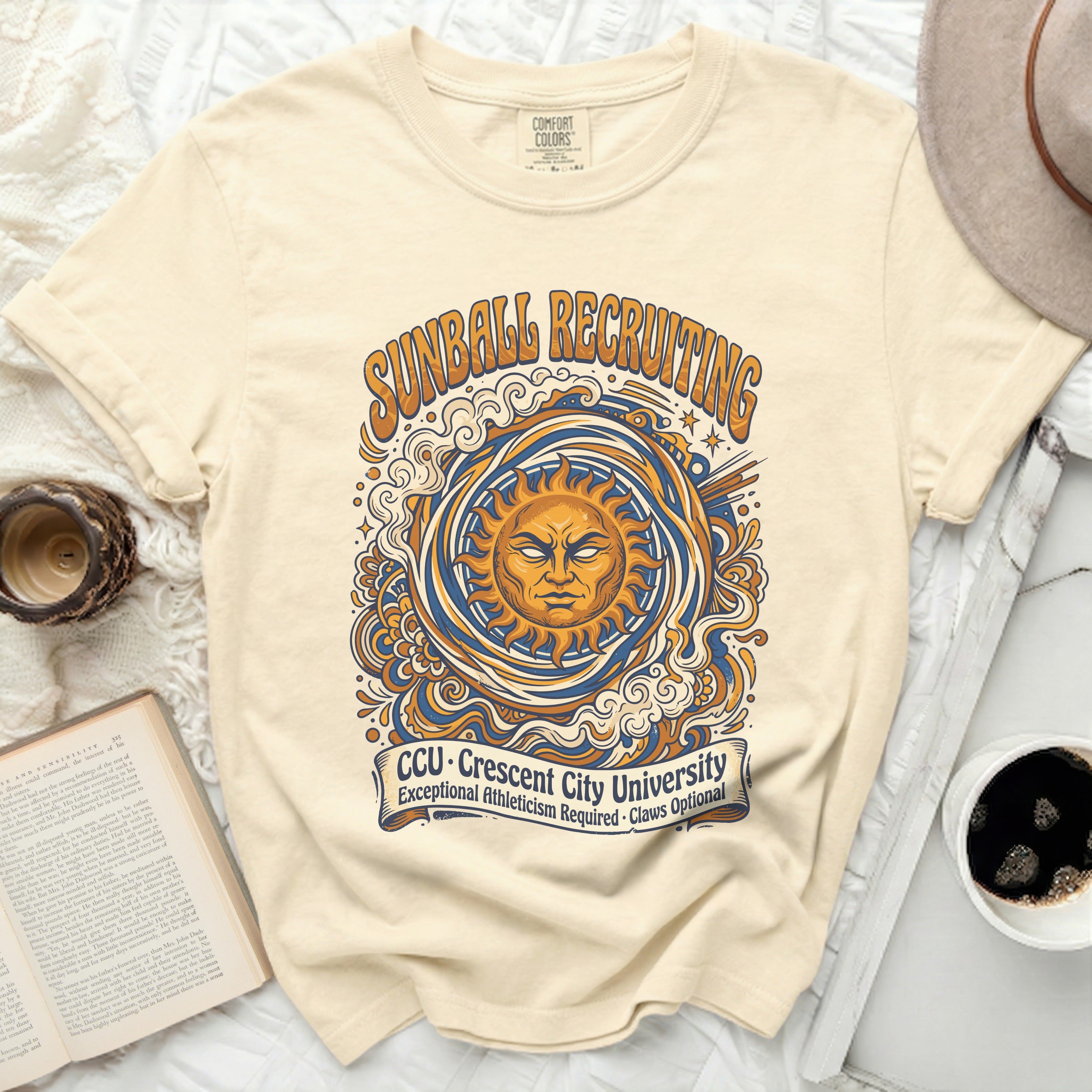 Cream t-shirt with sunburst and text 