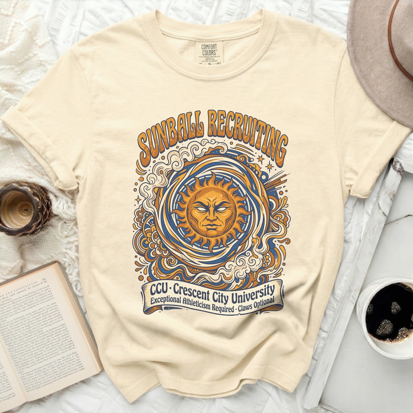 Cream t-shirt with sunburst and text "SUNBALL RECRUITING CCU Crescent City University".