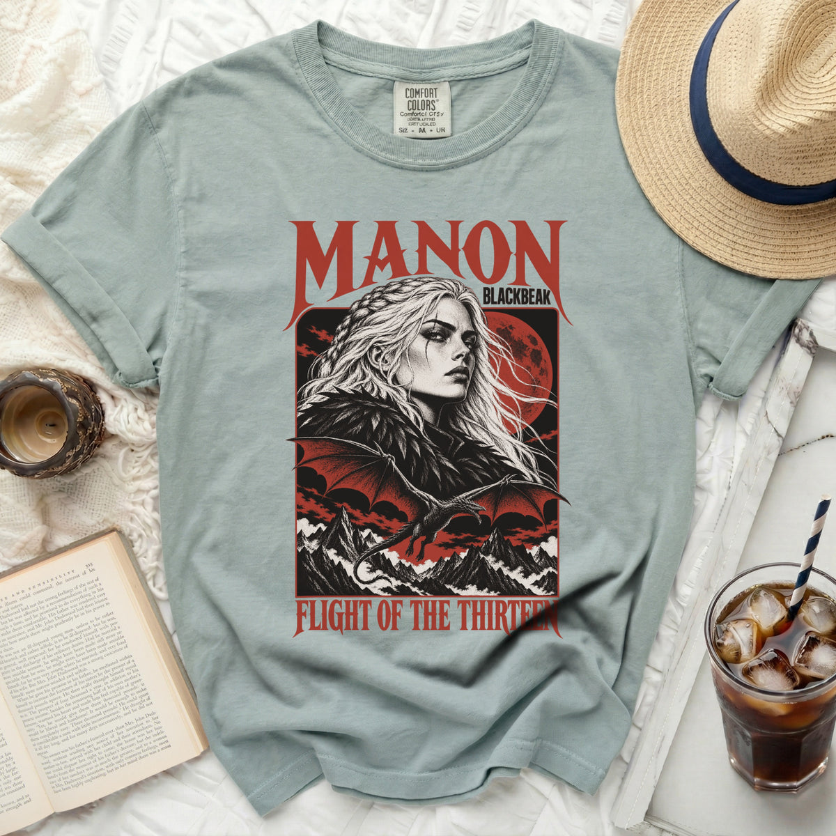 T-shirt with "Manon Blackbeak Flight of the Thirteen" dragon graphic.