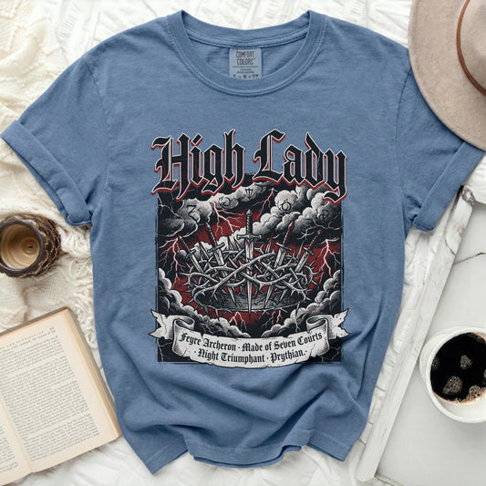 Blue t-shirt with "High Lady" text and swords in a crown of thorns.