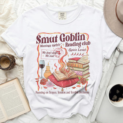 White t-shirt with "Smut Goblin Reading Club" design and humorous text.