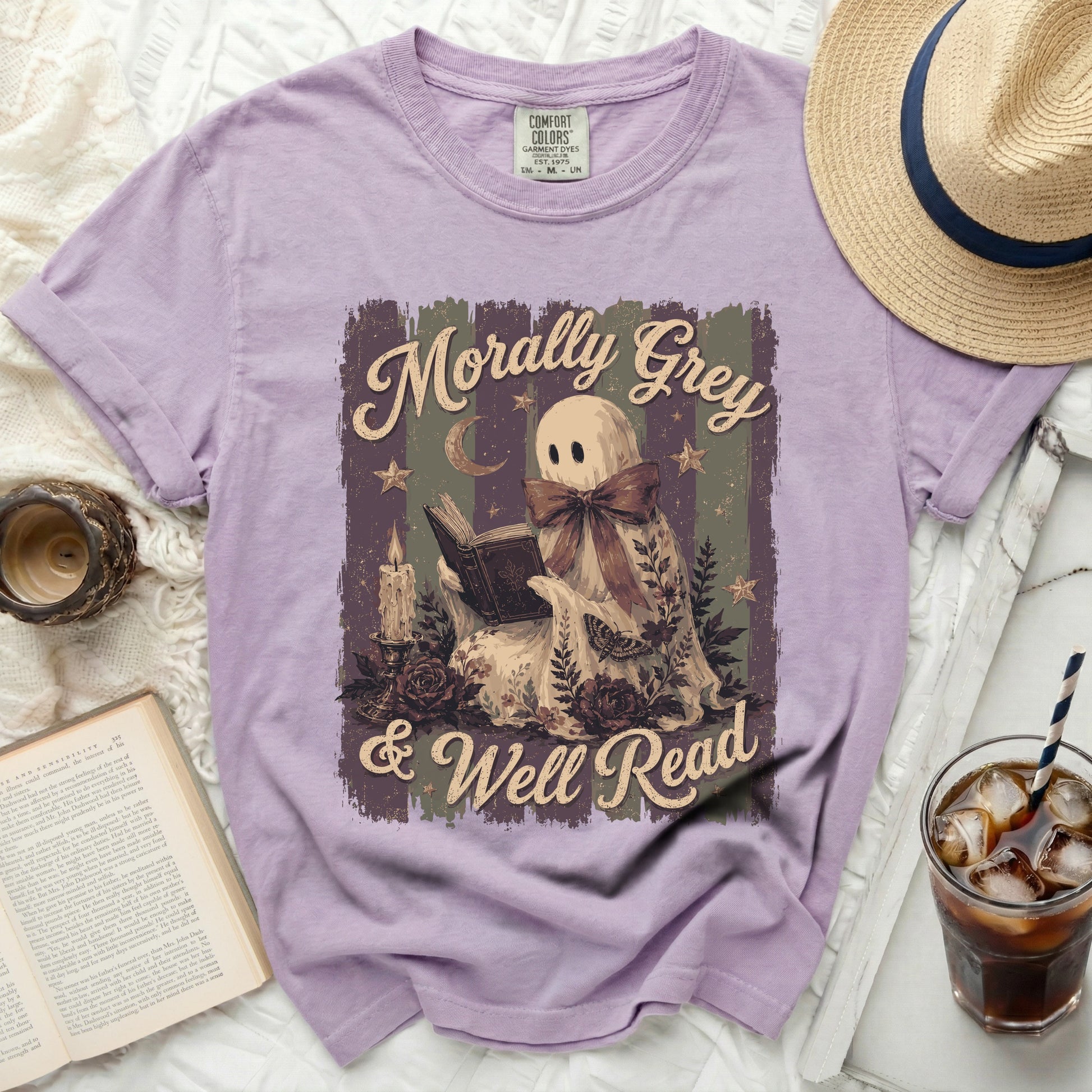 Purple t-shirt with ghost reading book graphic and text "Morally Grey & Well Read".