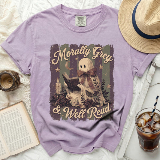 Purple t-shirt with ghost reading book graphic and text "Morally Grey & Well Read".
