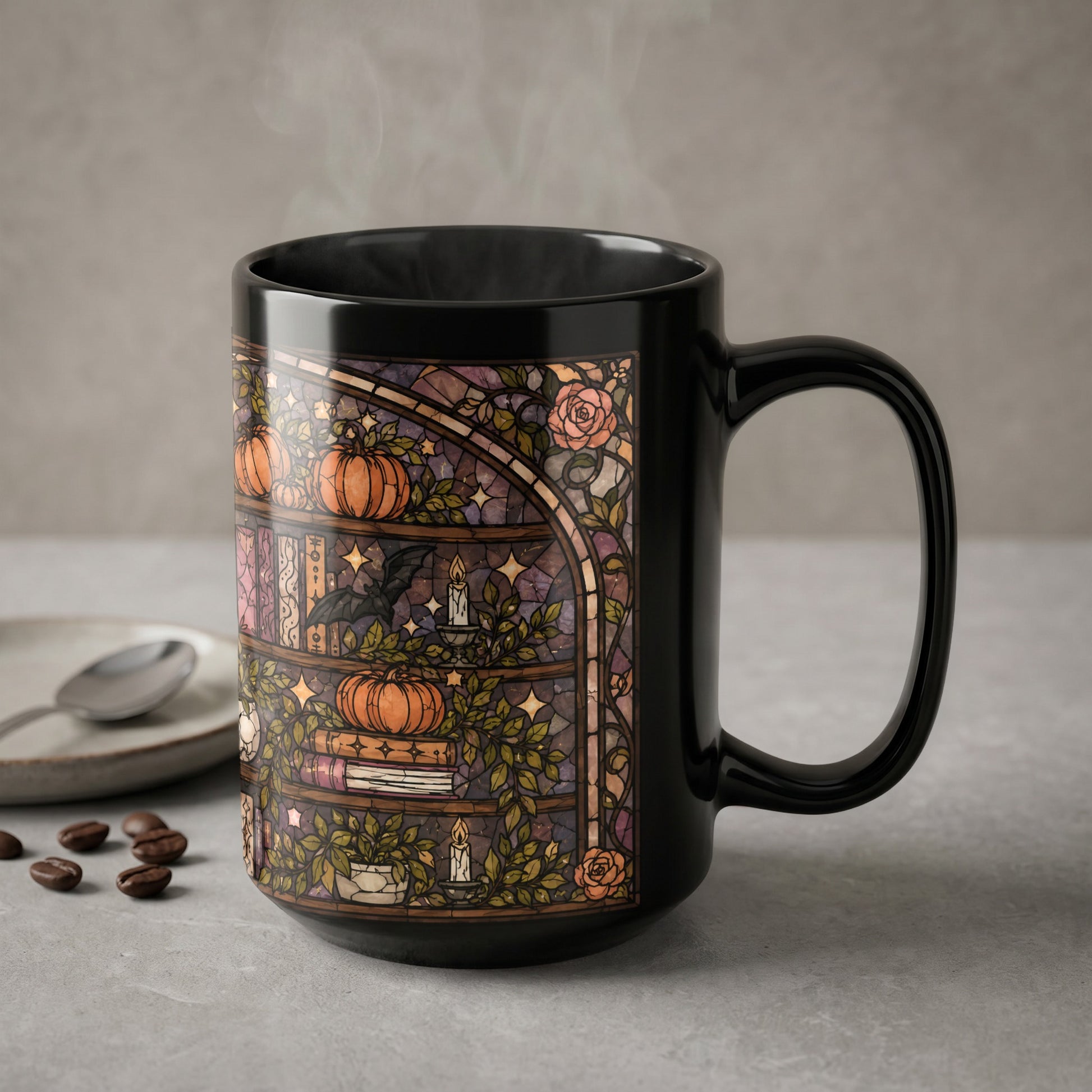 Black mug with stained glass art featuring pumpkins, books, and a bat.
