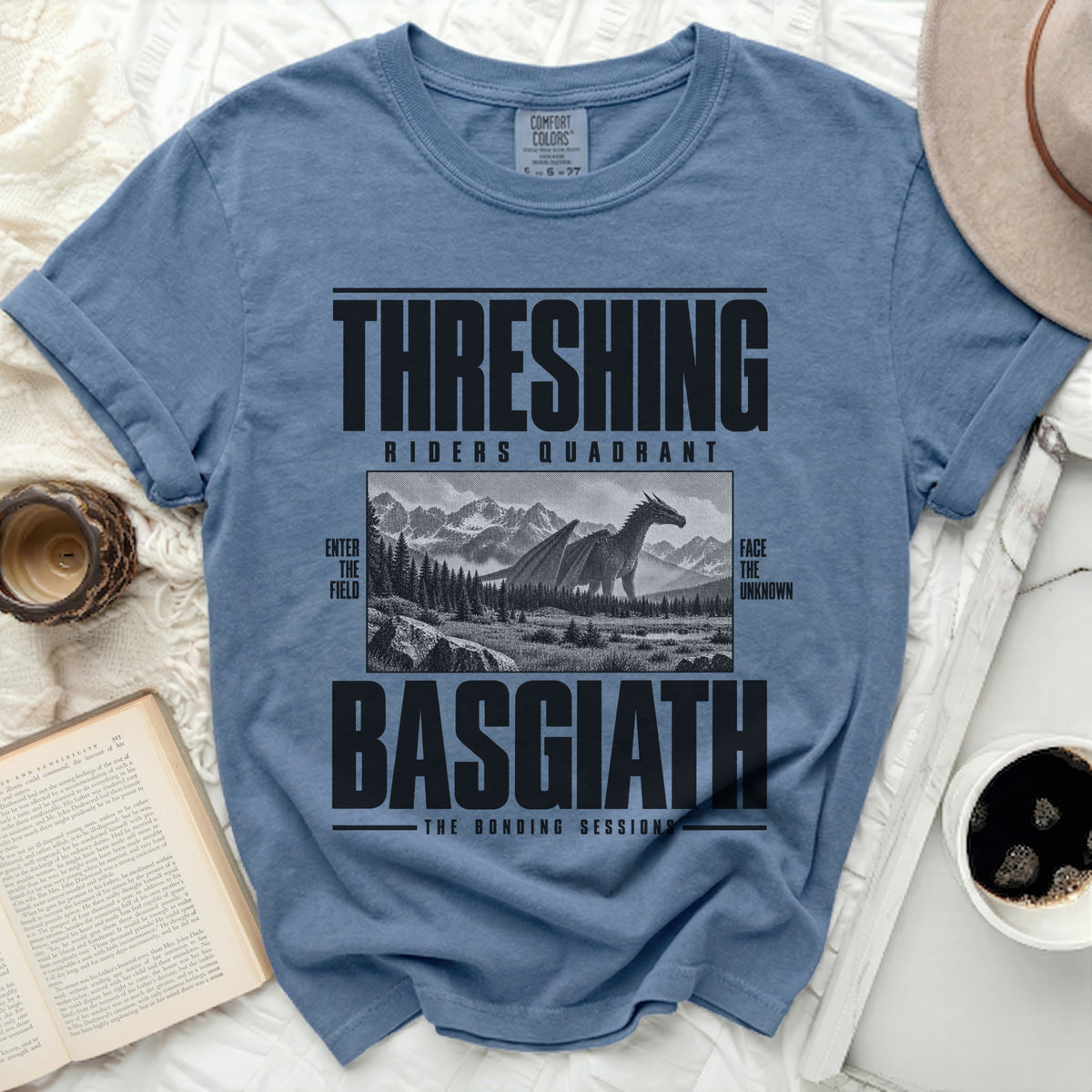 Blue t-shirt with "THRESHING RIDERS QUADRANT BASGIATH THE BONDING SESSIONS" text and dragon image.