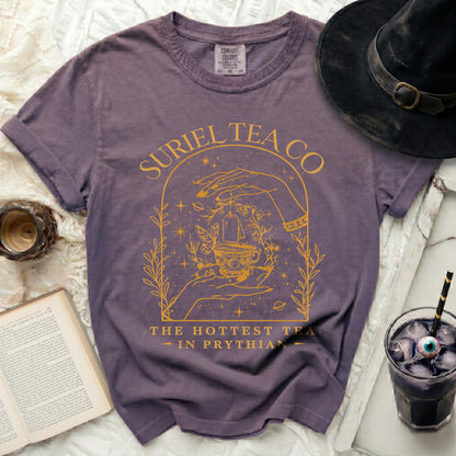 Purple t-shirt with "Suriel Tea Co. The Hottest Tea in Phrythian" graphic.